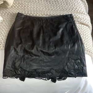 Black faux leather skirt with embroidery